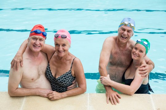 Senior couples enjoying in pool