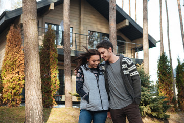couple walking in forest