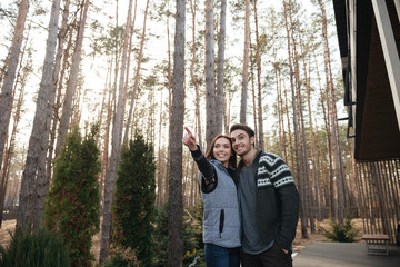 Couple standing on doorstep
