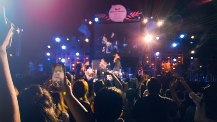 Fototapeta premium Silhouettes of concert crowd