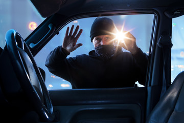 male robber car theft break in at night
