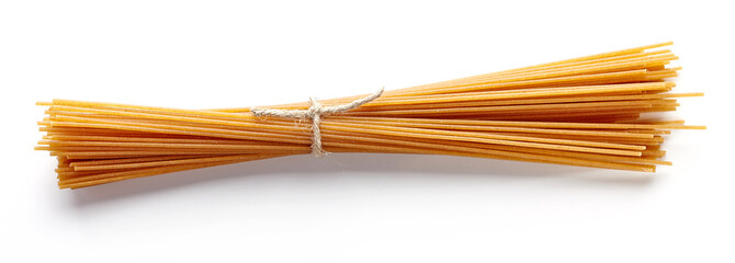 Whole grain spaghetti pasta isolated on white, from above
