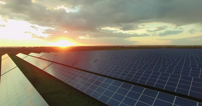 Aerial Solar panels in a field on a sunny day