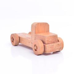 Children toy car made of wood .