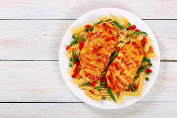 grilled Chicken breasts with fusilli pasta