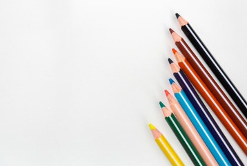 Colored pencils isolated on white