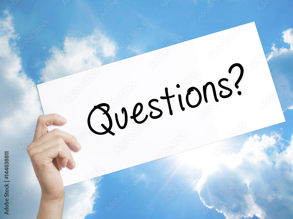 Fototapete questions? sign on white paper. man hand holding paper with text. isolated on sky background