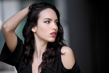 Fototapeta premium Beautyful girl in urban background