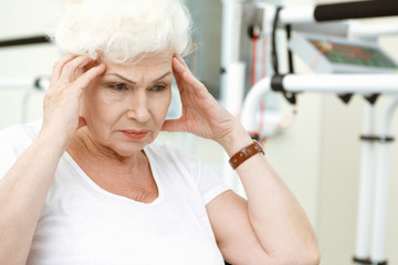 Senior woman having a headache