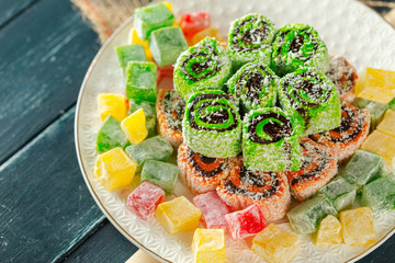 traditional eastern desserts on wooden background