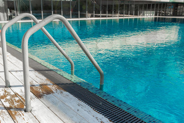 Swimming pool with stair at hotel