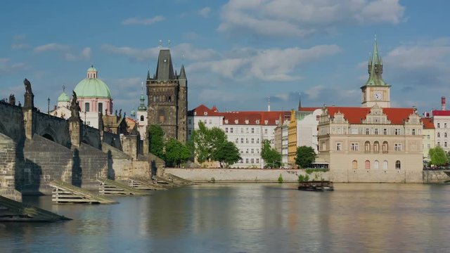 Zoom in timelapse of Prague in a cloudy summer day