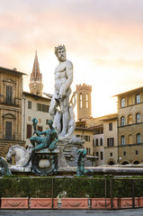 Fototapeta na wymiar Fountain of Neptune sunrise view, Florence, Italy