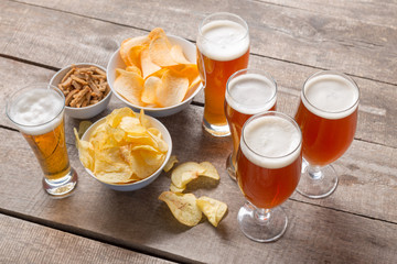 glass beer on wood background