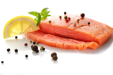 salmon fish,rosemary and lemon on white background