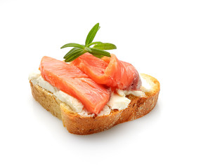 Salmon fillet sandwich with cream cheese isolated on white background.