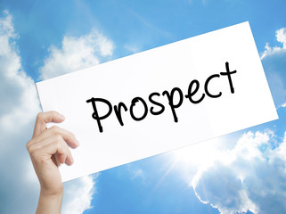 Prospect Sign on white paper. Man Hand Holding Paper with text. Isolated on sky background