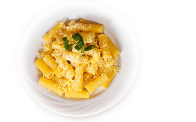 rigatoni pasta with cheese in a plate. top view. isolated on white