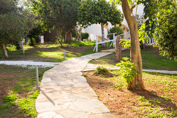 Pathway in garden,green lawns with bricks pathways,garden landscape design