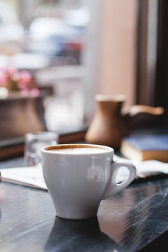 Coffee cup , laptop in coffee shop , business,