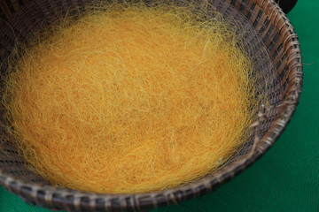 Hand made of yellow raw thread silk from silkworm cocoons.