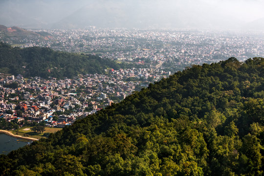 View to Pokhara city from World Peace Stupa near Phewa lake in Nepal