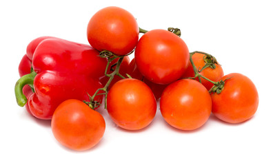 Red paprika and tomato on white background