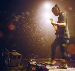 Guitarist performing on stage. Concert.