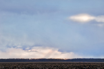 Clouds over the autumn fields