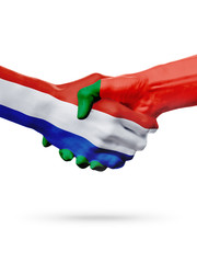 Flags Netherlands, Portugal countries, partnership friendship handshake concept.