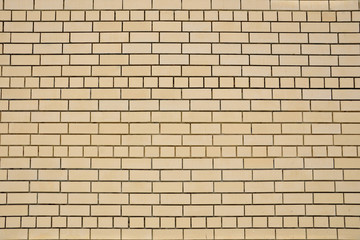 Beige brick wall