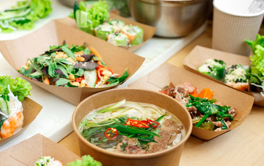 Street vendor's salads, closeup of snacks in craft package