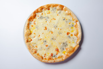 Italian delicious pizza with cheese on a white plate
