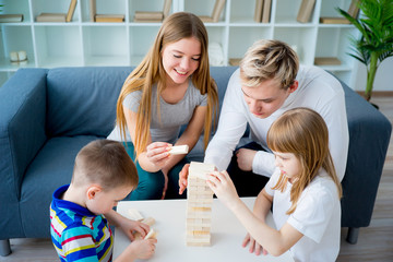 Family playing Jenga