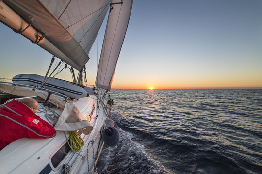 Sailing during the sunrise (Cote d'Azur, Alpes-Maritimes department, Provence-Alpes-Cote d'Azur region, France, Balearic Sea, Mediterranean Sea, Europe)