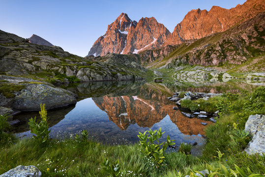 Italy, Piedmont, Cuneo District, Po Valley, Crissolo - Summer sunrise at Superiore Lake