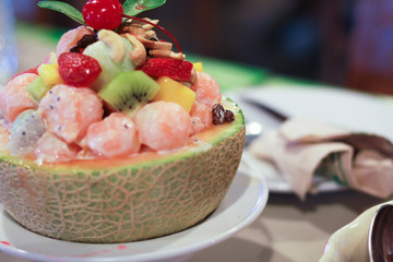 The fruit salad in a melon bowl