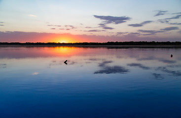 sunset on the lake as a backdrop