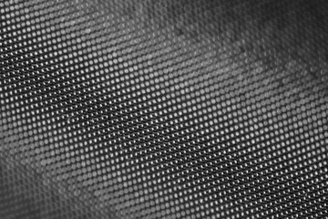 Black and white tone. Closeup of fabrics texture and blurry background
