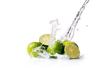 Fototapeta na wymiar Water splash with lime isolated on white background. Splash motion with fruits. Abstract object 