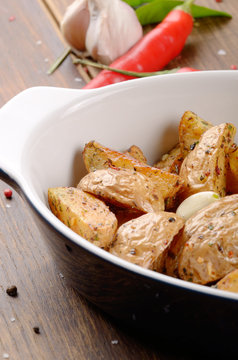 Ceramic dish with Fried potatoes
