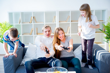 Family playing video games