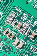 Electronic components on the printed circuit board.