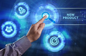 Business, Technology, Internet and network concept. Young businessman working on a virtual screen of the future and sees the inscription: New product
