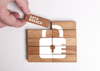 Business, Technology, Internet and network concept. Young businessman shows the word: Data breach