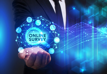 Business, Technology, Internet and network concept. Young businessman working on a virtual screen of the future and sees the inscription: Online survey