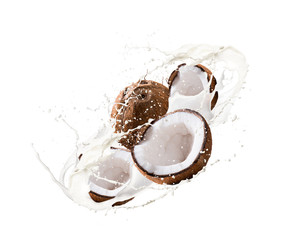 Fruit, coconut in milk splash, isolated on white background