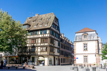 Obraz premium STRASBOURG, FRANCE - August 23, 2016 : Street view of Traditional houses in Strasbourg, Alsace. is the official seat of the European Parliament, Located close to the border with Germany