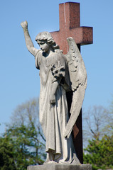Fototapeta na wymiar Statue of Angel on cross