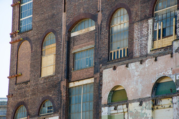 Large building wall partly demolished for re-development